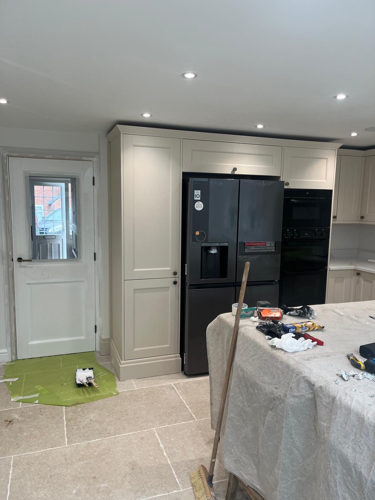 4D Construction finished shaker kitchen with brass lighting